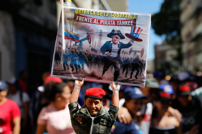 Manifestación organizada por el gobierno en contra de la intervención estadunidense en Caracas, Venezuela, el pasado sábado 13 de diciembre de 2025. Foto AP